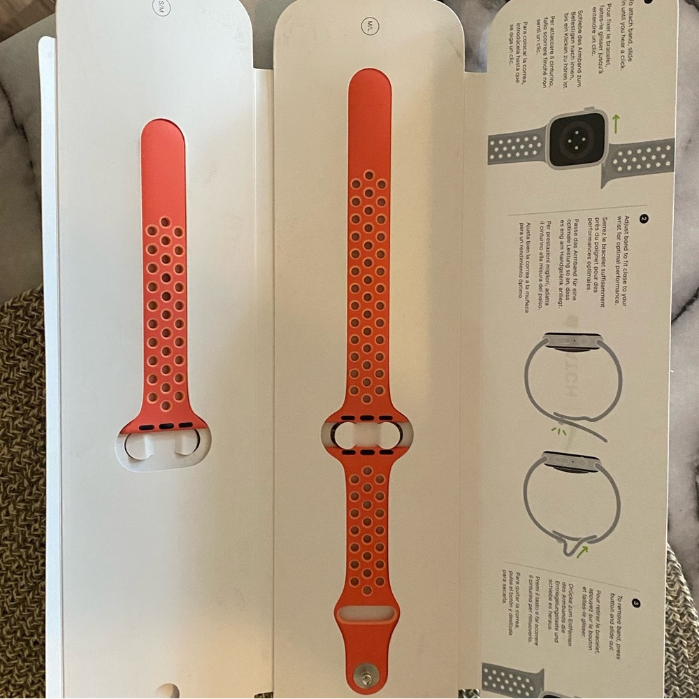Apple Watch Nike band - peachy red color